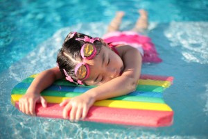 Girl_with_styrofoam_swimming_board